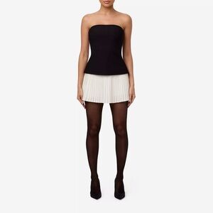 naked wardrobe Black Strapless Top with White Pleated Mini Skirt